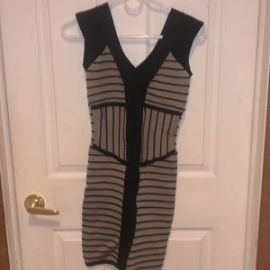 Black and gray 2b Bebe dress in the size extra small